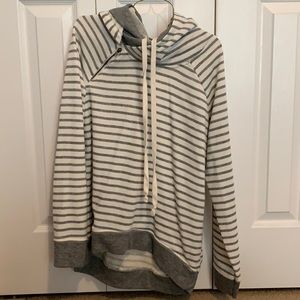 White and grey striped sweatshirt with zipper detail